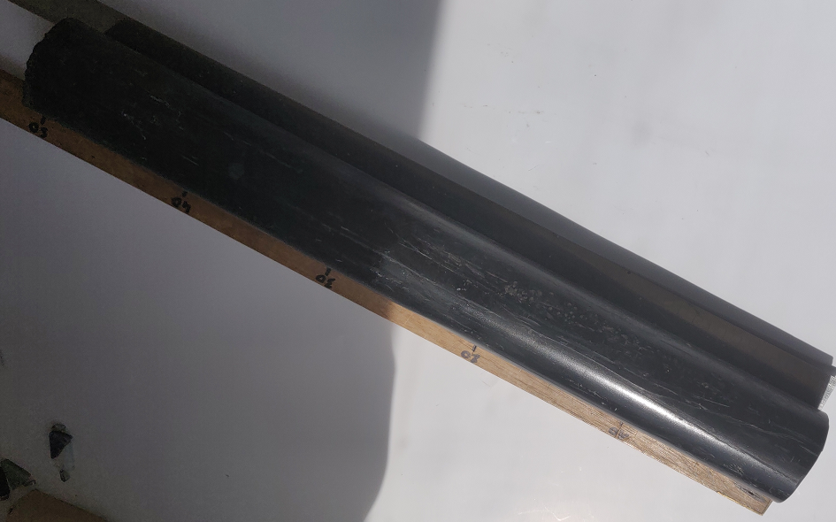 Rsine noire, diam 58 mm, long 490 mm, pds 1.550 kg